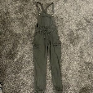 Olive green jump suit.